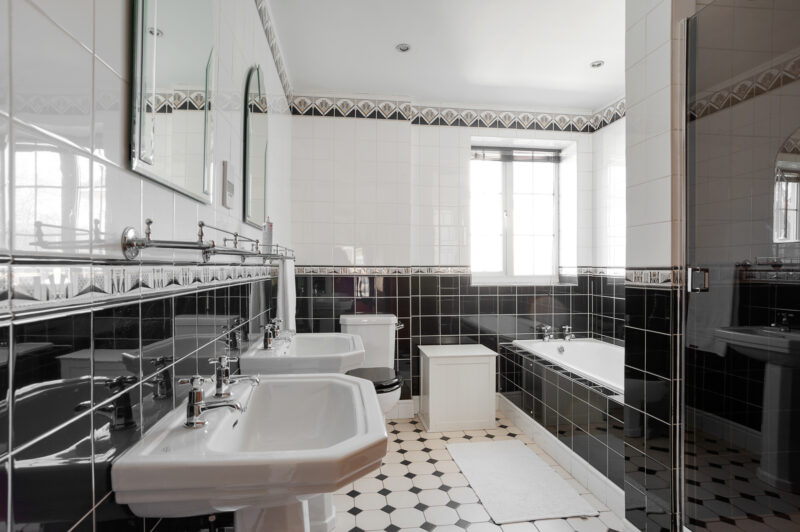 Bathroom art deco double sink mirror bath shower tile TV filming location hire lodge London 84