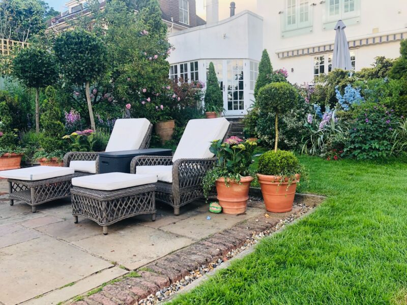 Garden furniture terracota pots white house plants 1930s trees lawn TV filming location hire lodge London 31