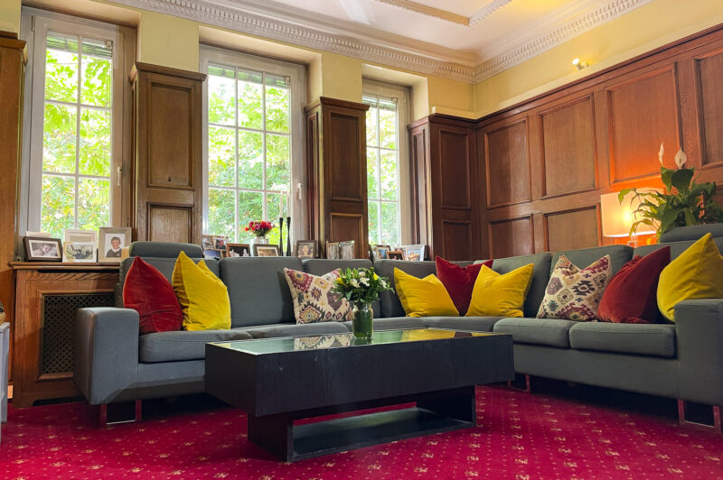 Lounge room sofa windows 1930s Art Deco red carpet filming location hire lodge London 101