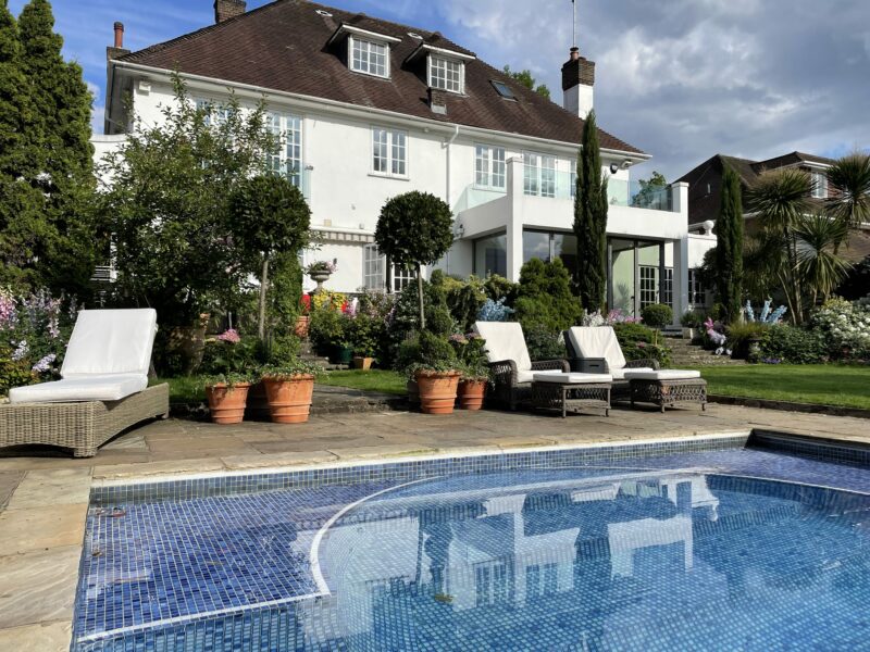 Mosaic garden white house swimming pool trees pool furniture filming location hire lodge London 14