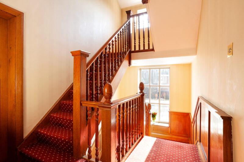 Staircase bannister Art Deco oak panel sunlight windows filming location hire lodge London 43