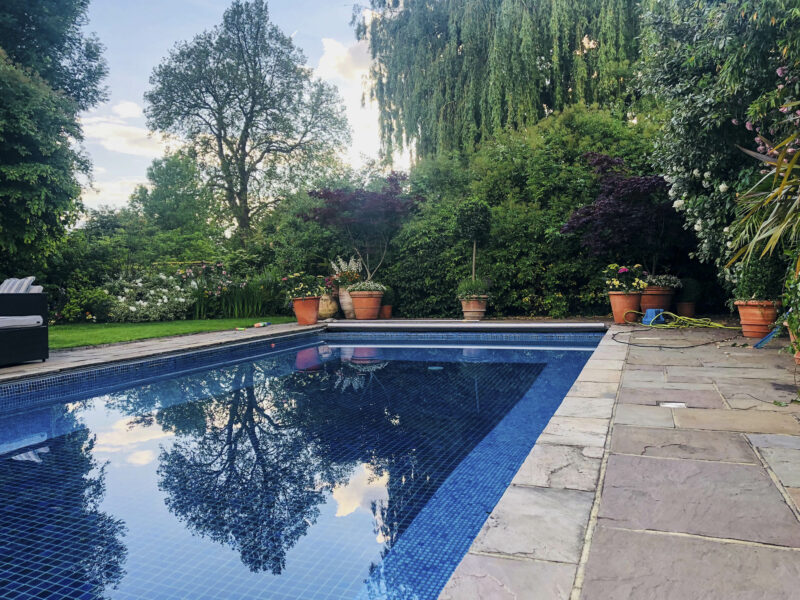 Terracotta garden swimming pool trees TV filming location hire lodge London 23