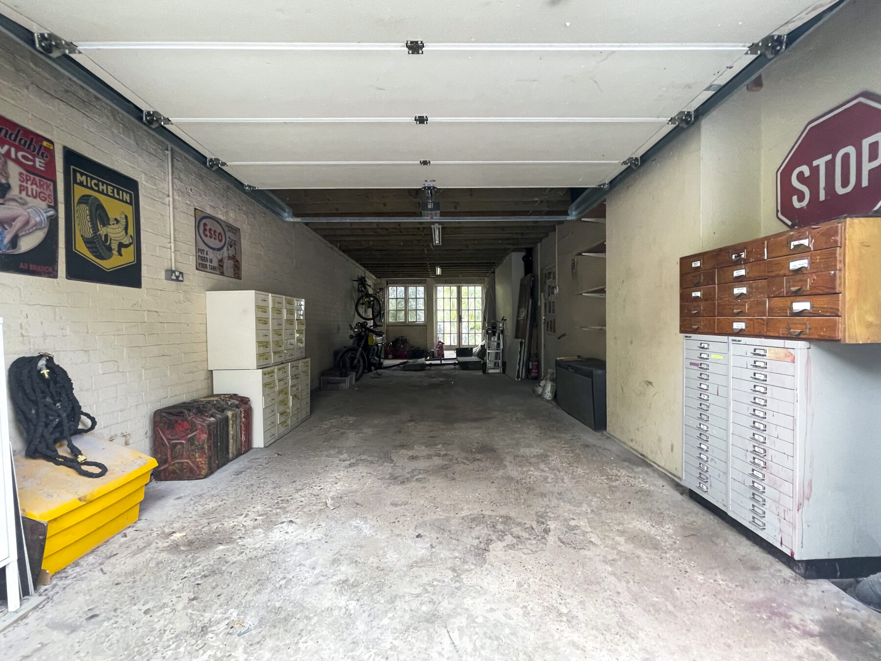 Garage spacious storage drawers bike rack TV filming location hire lodge London 91