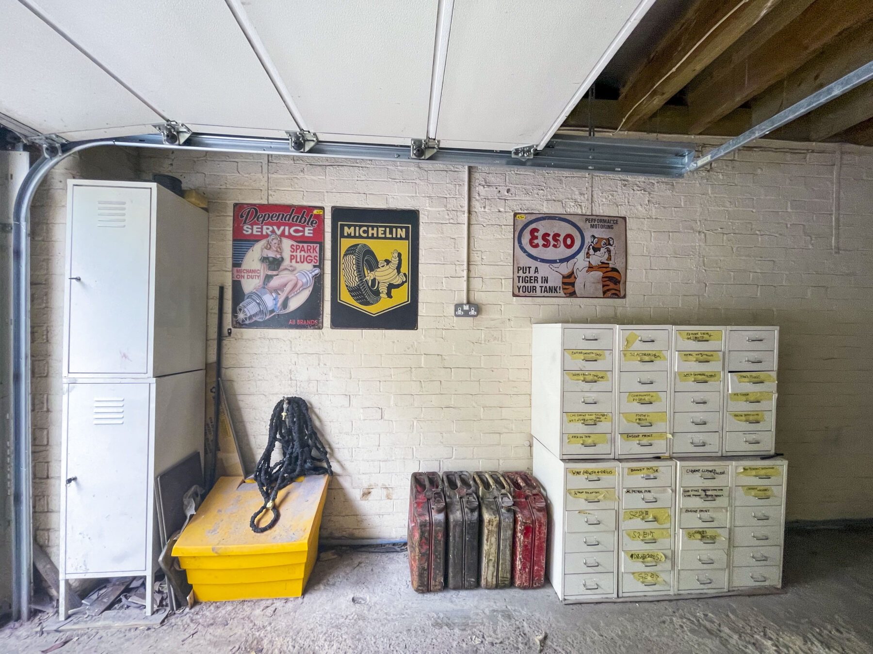 Garage spacious storage stone wall posters TV filming location hire lodge London 93