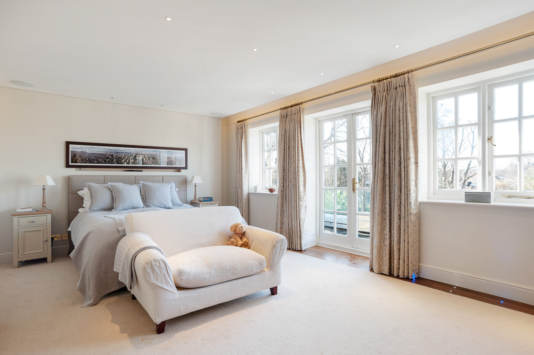 Master bedroom cream sofa bedside terrace TV filming location hire lodge London 69